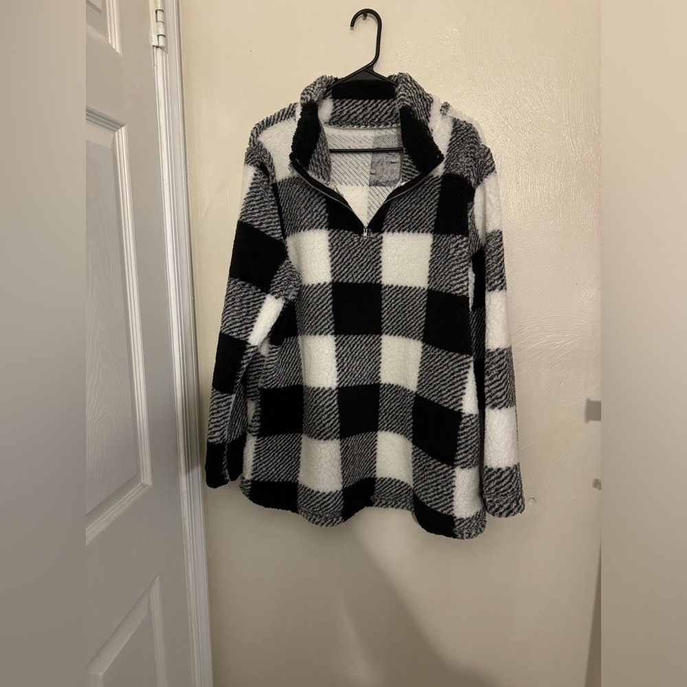 Throw over black/grey and white fleece sweater
